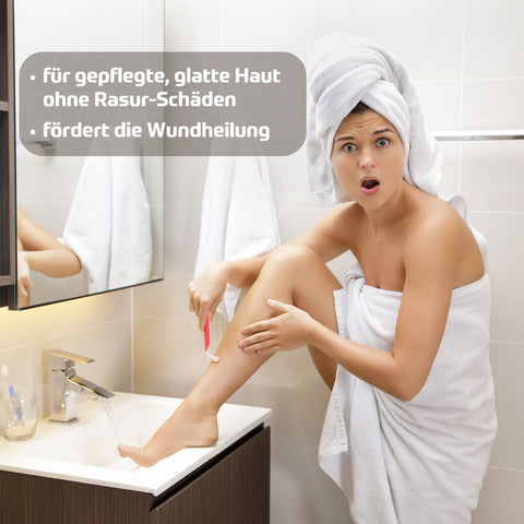 Holzhacker Aloe Vera Creme - Foto von Frau, die sich im Badezimmer die Beine rasiert mit Text: für gepflegte, glatte Haut ohne Rasur-Schäden, fördert die Wundheilung. | Naturpräparate Dieterich