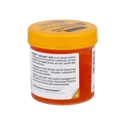 Enzborn Teufelssalbe Heiß 200 ml Dose Rückseite mit Anwendungstext und Beschreibung der wärmenden Wirkung, orangefarbene Massagecreme mit Teufelskralle-Extrakt zur Förderung der Entspannung bei Muskelverspannungen, Kälteempfindlichkeit und Steifheit, intensiv wärmendes Pflegegel für Muskeln und Gelenke, hergestellt in Deutschland von Enzborn. Naturpräparate Dieterich