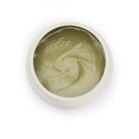 GUAM Algenfango gegen Cellulite in geöffneter Dose, grüne Algenpaste mit cremiger Textur, hautstraffende und körperumfang-reduzierende Körperpflege - Naturpräparate Dieterich