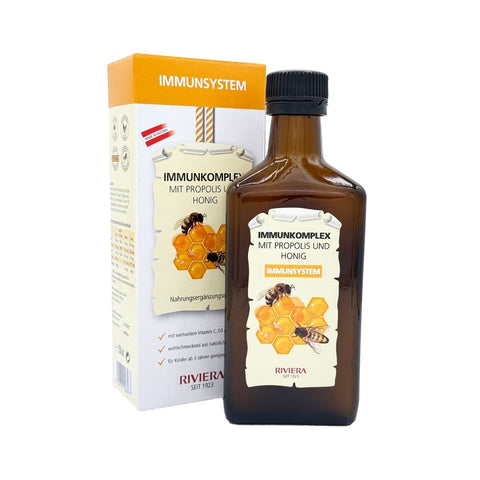Riviera Immunkomplex mit Propolis und Honig 250 ml, Faltschachtel und braune Glasflasche vor weißem Hintergrund | Naturpräparate Dieterich